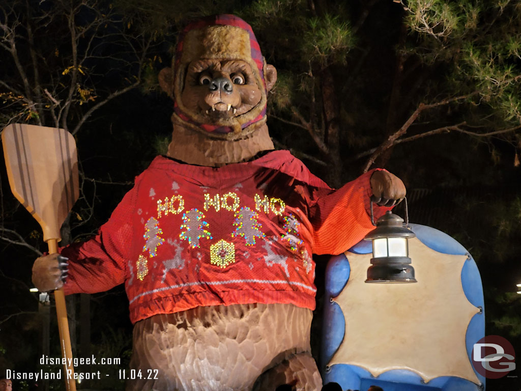 The bear has his sweater on and its lights were on this evening.