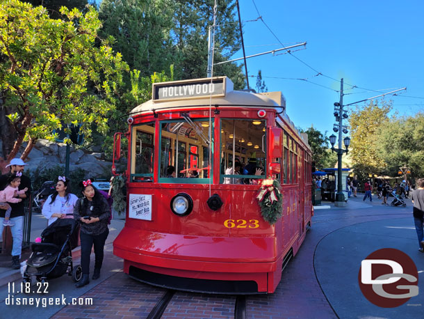 A Red Car picking up guests in Carthay Circle