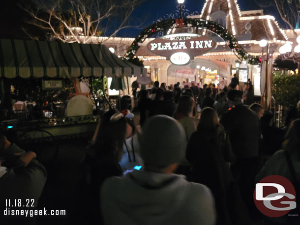 7:36pm - The line for Plaza Inn stretches out to the walkway.