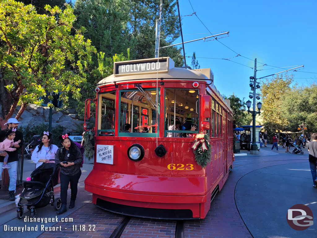 A Red Car picking up guests in Carthay Circle