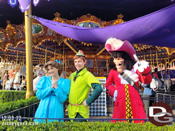 Wendy, Peter Pan and Captain Hook were out visiting guests near the Carousel. 