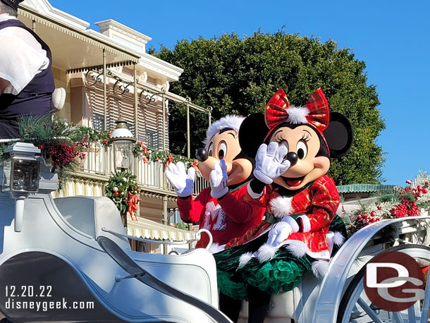 Mickey and Minnie Mouse in the lead carriage.  