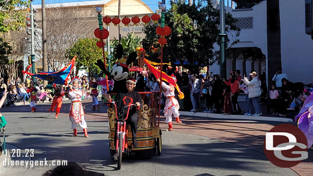 Oswald riding along in the procession