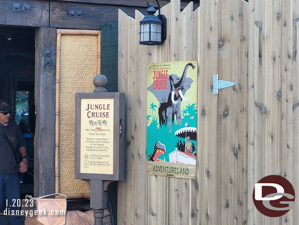 An attraction poster marks the entrance.