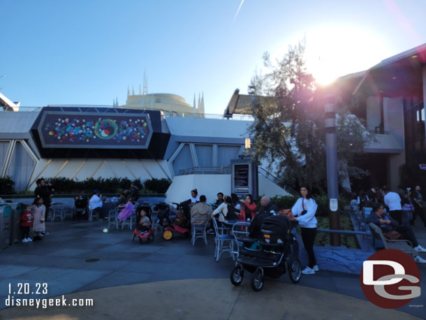 It is kind of awkward with tables right in front of the wait time board in Tomorrowland. People are trying to sit and relax and others keep walking up to read the board over their head.