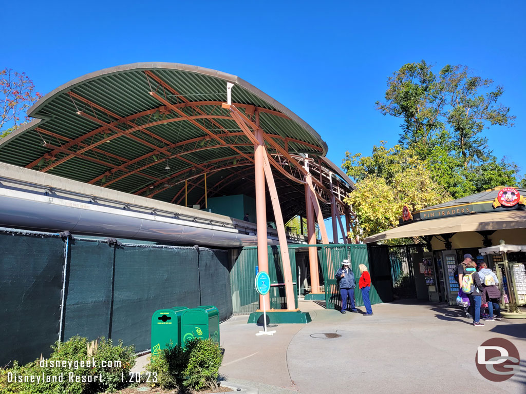 The Monorail is still operating, you enter and exit through this gate near the pin store.