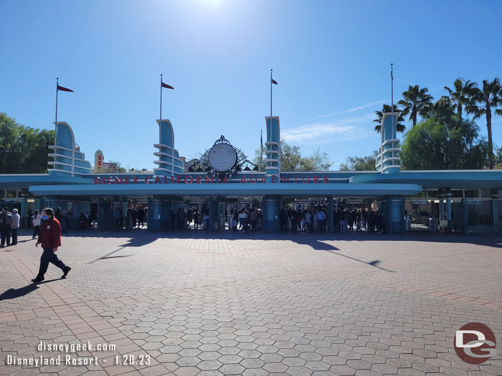 A Disney100 Medallion above the entrance to Disney California Adventure