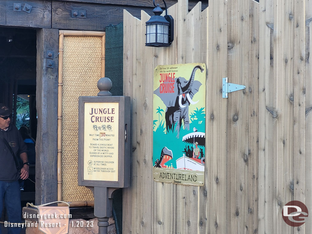 An attraction poster marks the entrance.