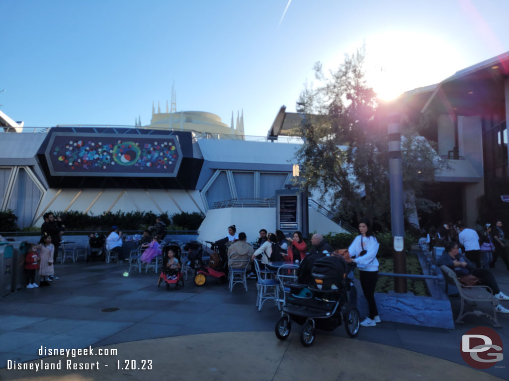 It is kind of awkward with tables right in front of the wait time board in Tomorrowland. People are trying to sit and relax and others keep walking up to read the board over their head.