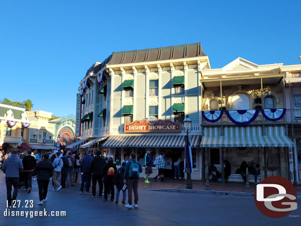 The line for merchandise in the music shop stretches to Town Square