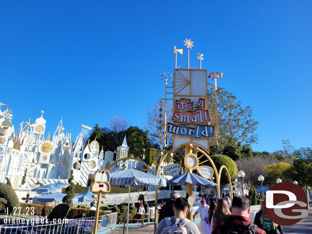 9:04am - it's a small world has a 5 minute wait posted.