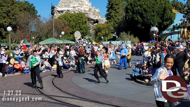 A group of dancers lead the way