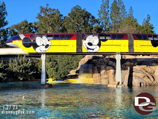 Monorail Red passing over the Sub Lagoon with its Get Your Ears On Wrap