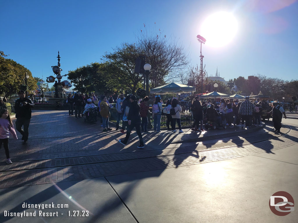 The line for popcorn buckets in the hub wrapped around to the center and back.