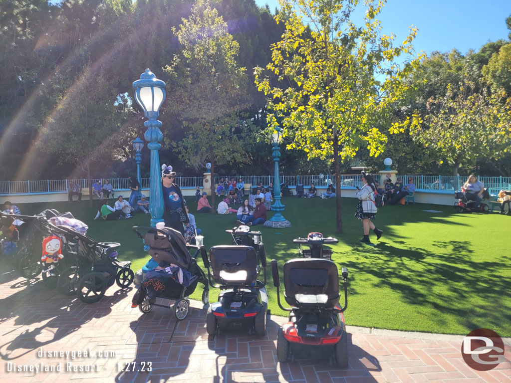 The fountain and pavement in front of Car Toon Spin has been replaced with a park.