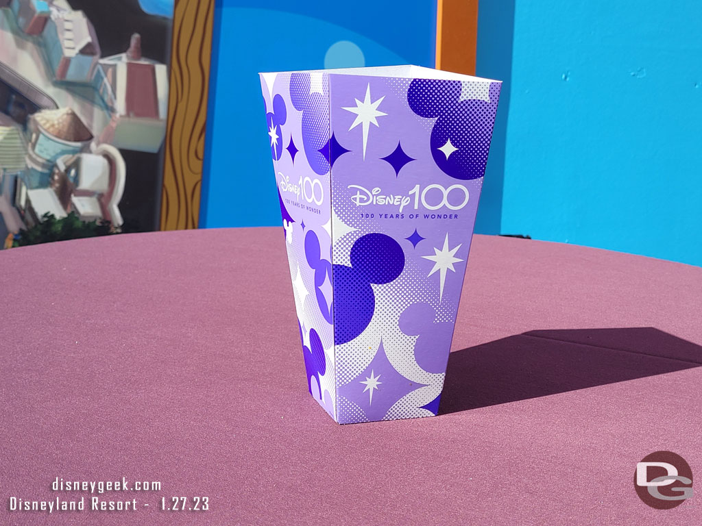 Random Disney100 popcorn container on a table..