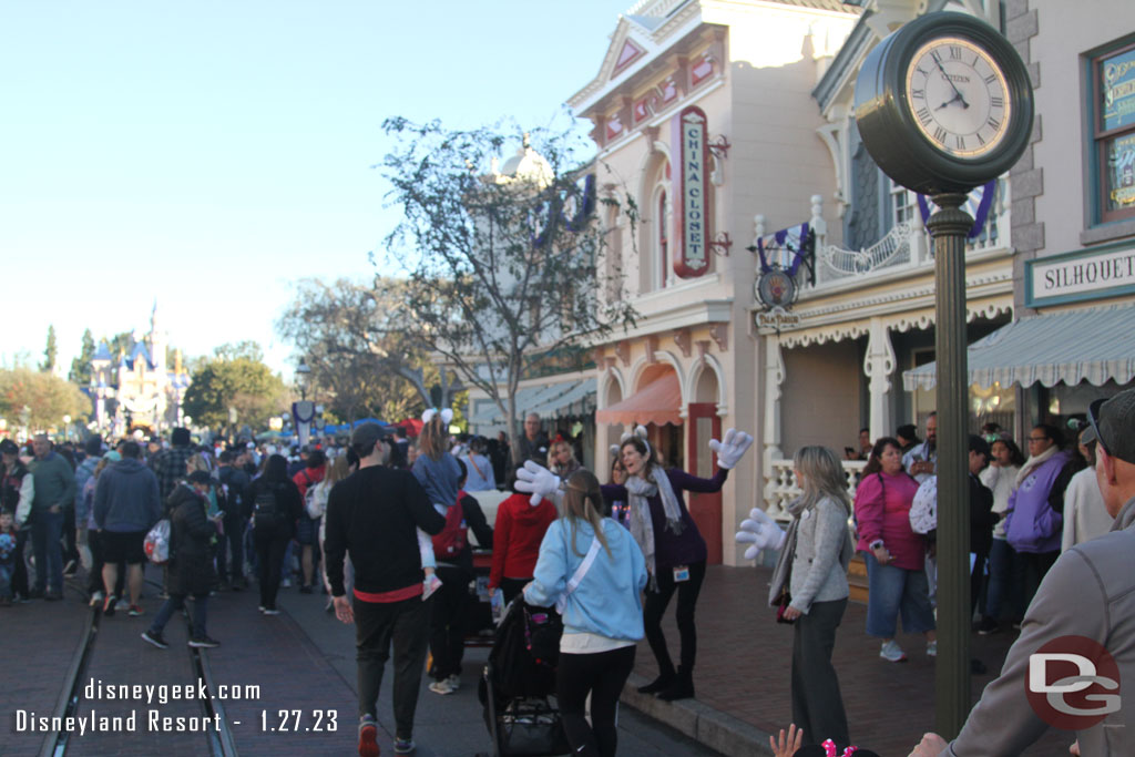 Cast members out greeting guests.