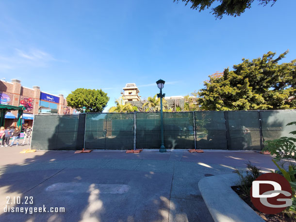 The fences for the walkway project have moved closer to the trading post and away from the Monorail entrance.