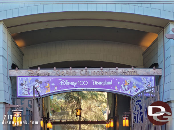 A Disney100 Banner at the Grand Californian Entrance