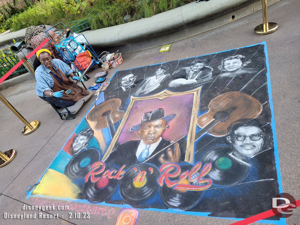 Chalk Artist Marcella Sweet working on this weeks creation.