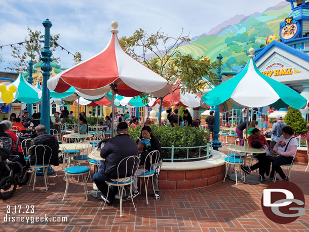 The tables and chairs are out in the courtyard.