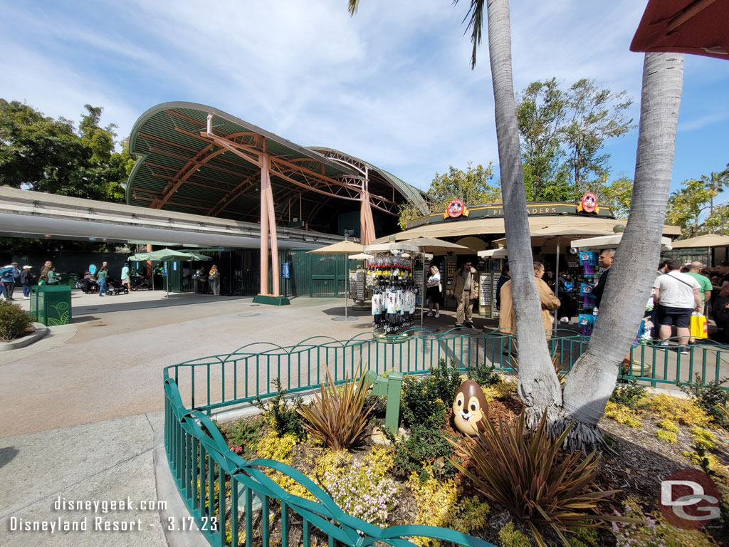 Spotted Chip in this planter near the Pin Traders (on the game board they call this the Monorail)