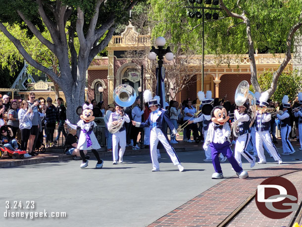 Mickey Mouse, Minnie Mouse and the Disneyland Band arrive in Town Square