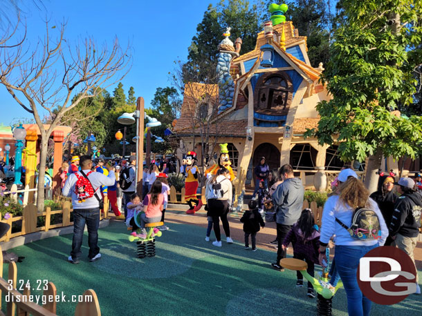 Goofy & Clarabelle performing near his house