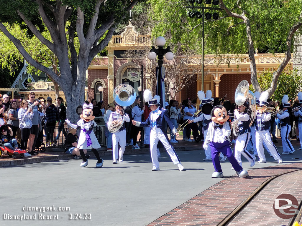 Mickey Mouse, Minnie Mouse and the Disneyland Band arrive in Town Square