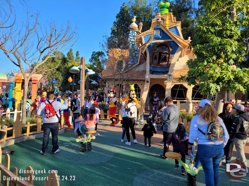 Goofy & Clarabelle performing near his house