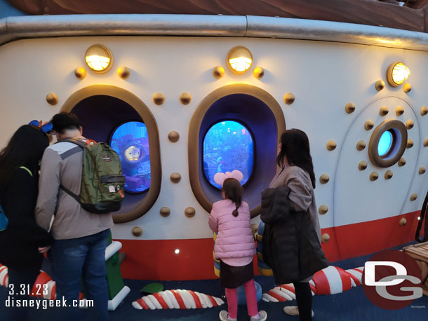 The portholes feature scenes now and you can interact with the with various devices to cause bubbles.