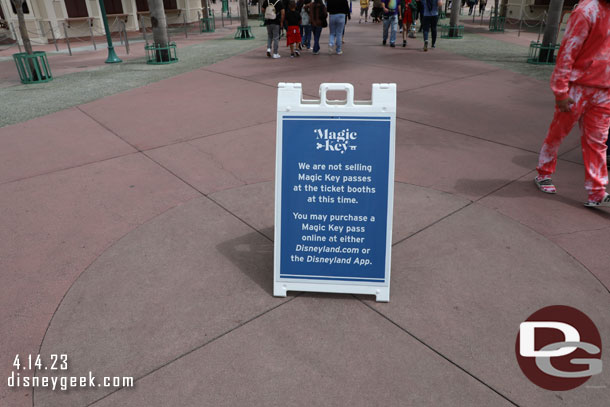 A sign warning guests you cannot purchase  Magic Key passes at the ticket windows.  You have to do it online.