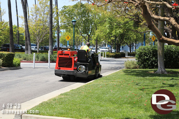 Picking up leaves and cleaning the walkways and parking lot.