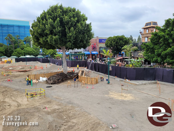 The walkway area looks leveled and the new planters are taking shape.