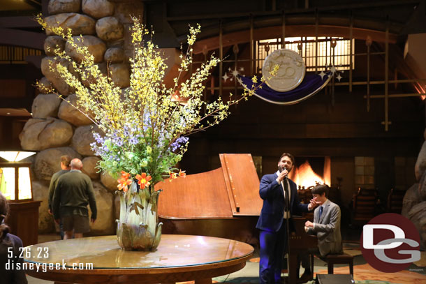 A performer in the Grand Californian Lobby this evening entertaining guests