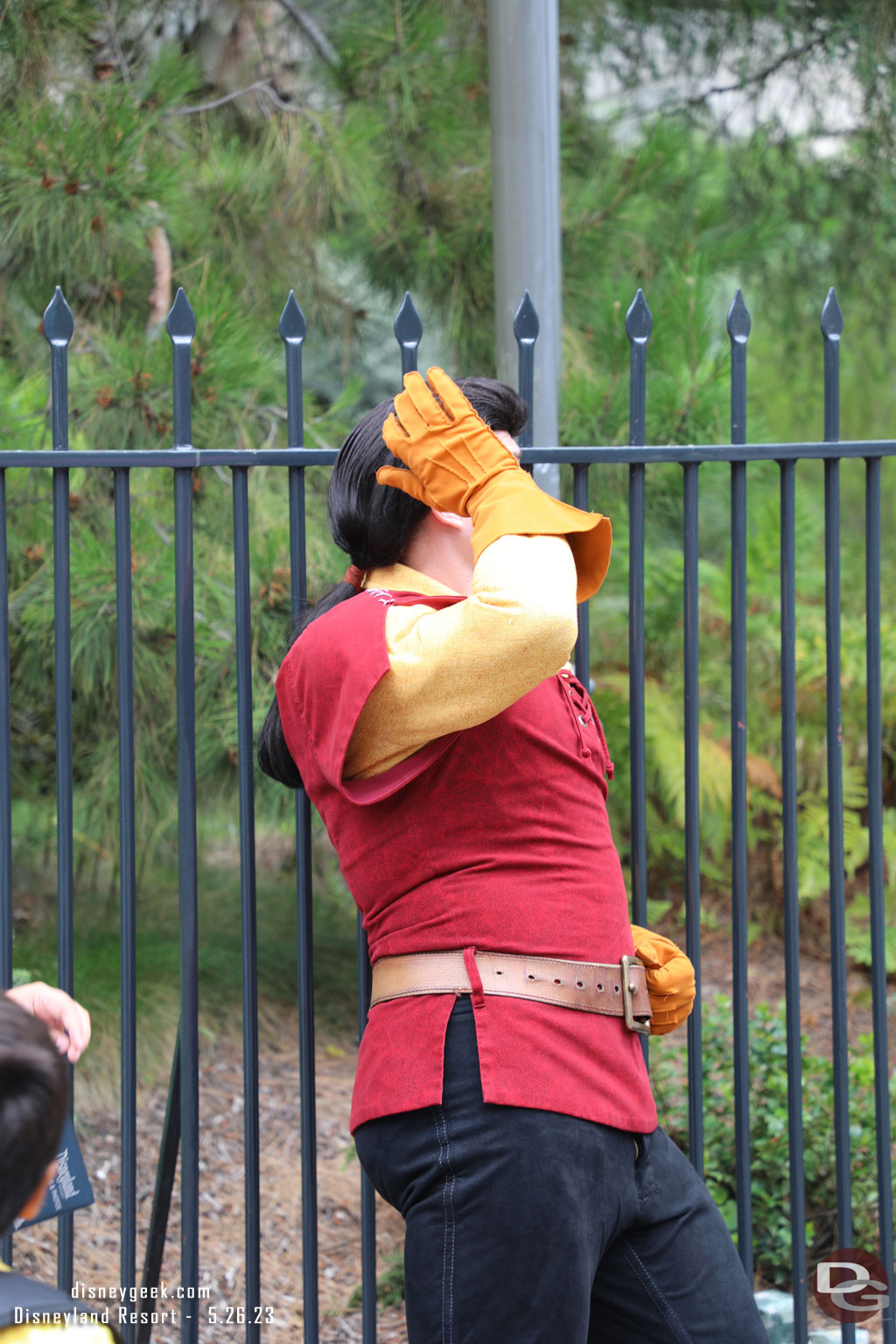 Gaston was posing for pictures across from the Alice in Wonderland attraction.