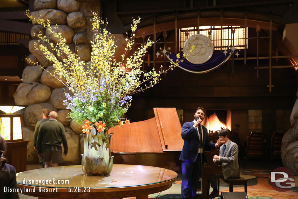 A performer in the Grand Californian Lobby this evening entertaining guests