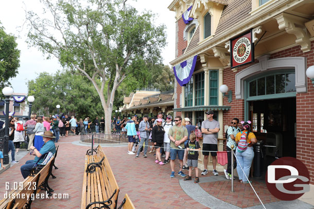 but the queue stretched out and around the area and down the steps