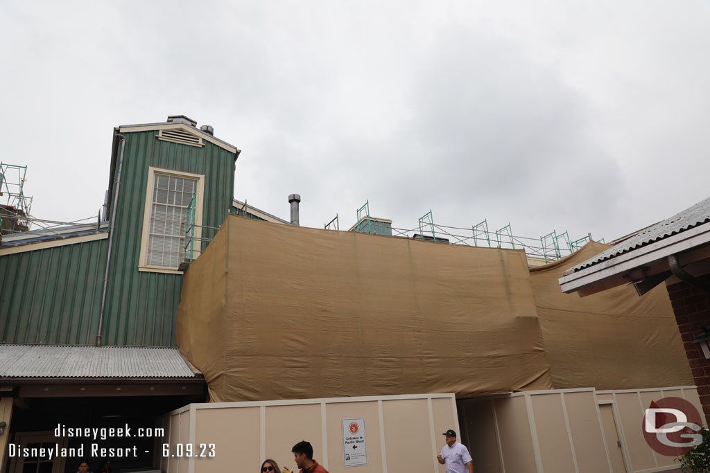 Scaffolding and scrims still obstruct the view of the bakery work.