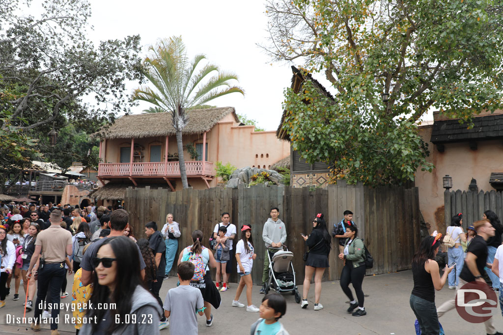 Walls are up around the fountain area in Adventureland.  There was a pipe issue here last weekend.  The restrooms are still accessible as are the walkways but it is narrow and congested.