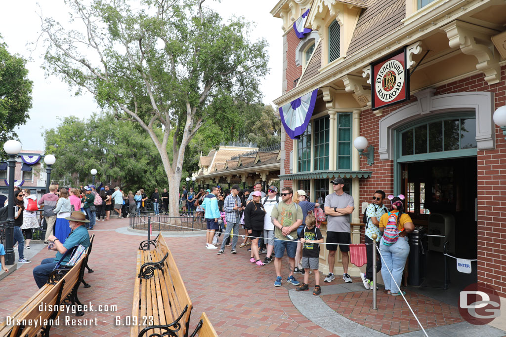 but the queue stretched out and around the area and down the steps