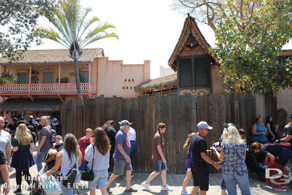 Walls still up at the entrance to Adventureland