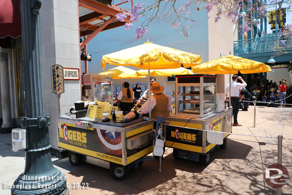 The outdoor vending carts feature graphics for the new show.