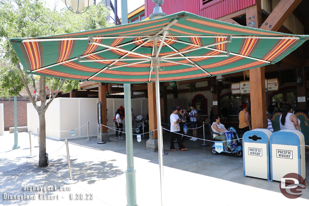 Walls are still up in the former covered seating area next to the pick up windows.