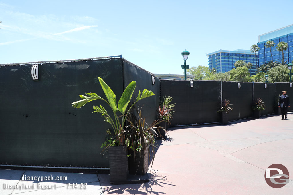 Nothing advertised on the fencing, just some plants and lights on it.