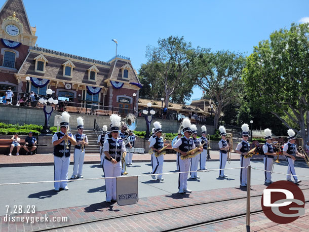 The Disneyland Band performing. Cast Members were blocking off the area for reserved parade viewing.