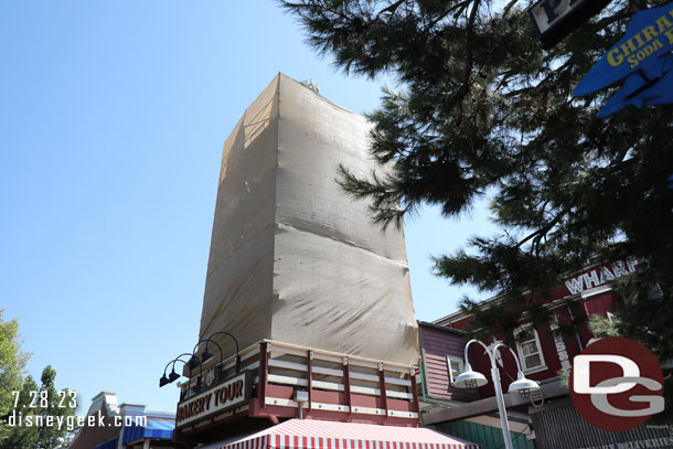 Scrims up around the silo at the bakery entrance.