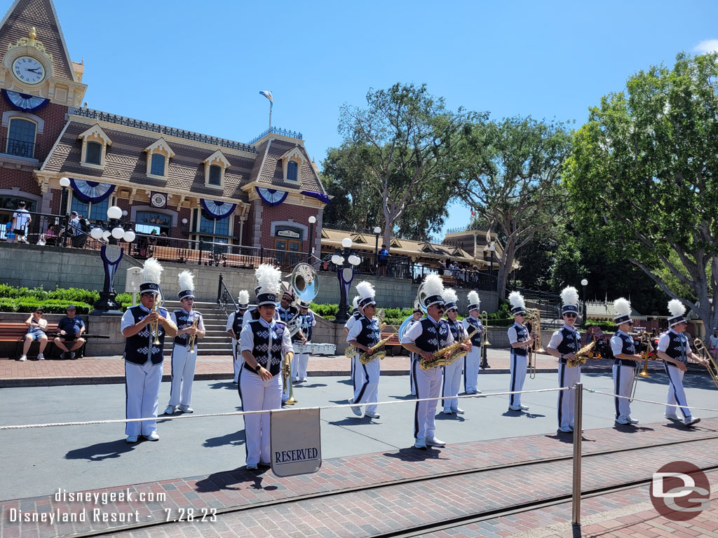 The Disneyland Band performing. Cast Members were blocking off the area for reserved parade viewing.