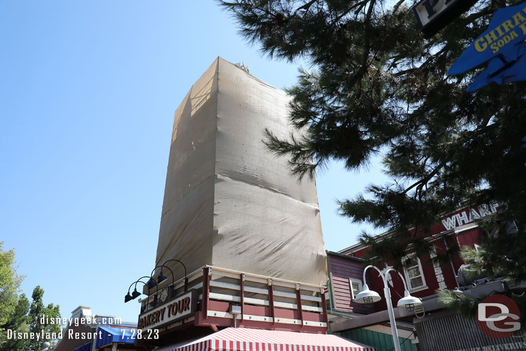 Scrims up around the silo at the bakery entrance.