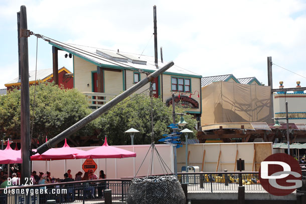 Scaffolding up over the far portion of the building now.